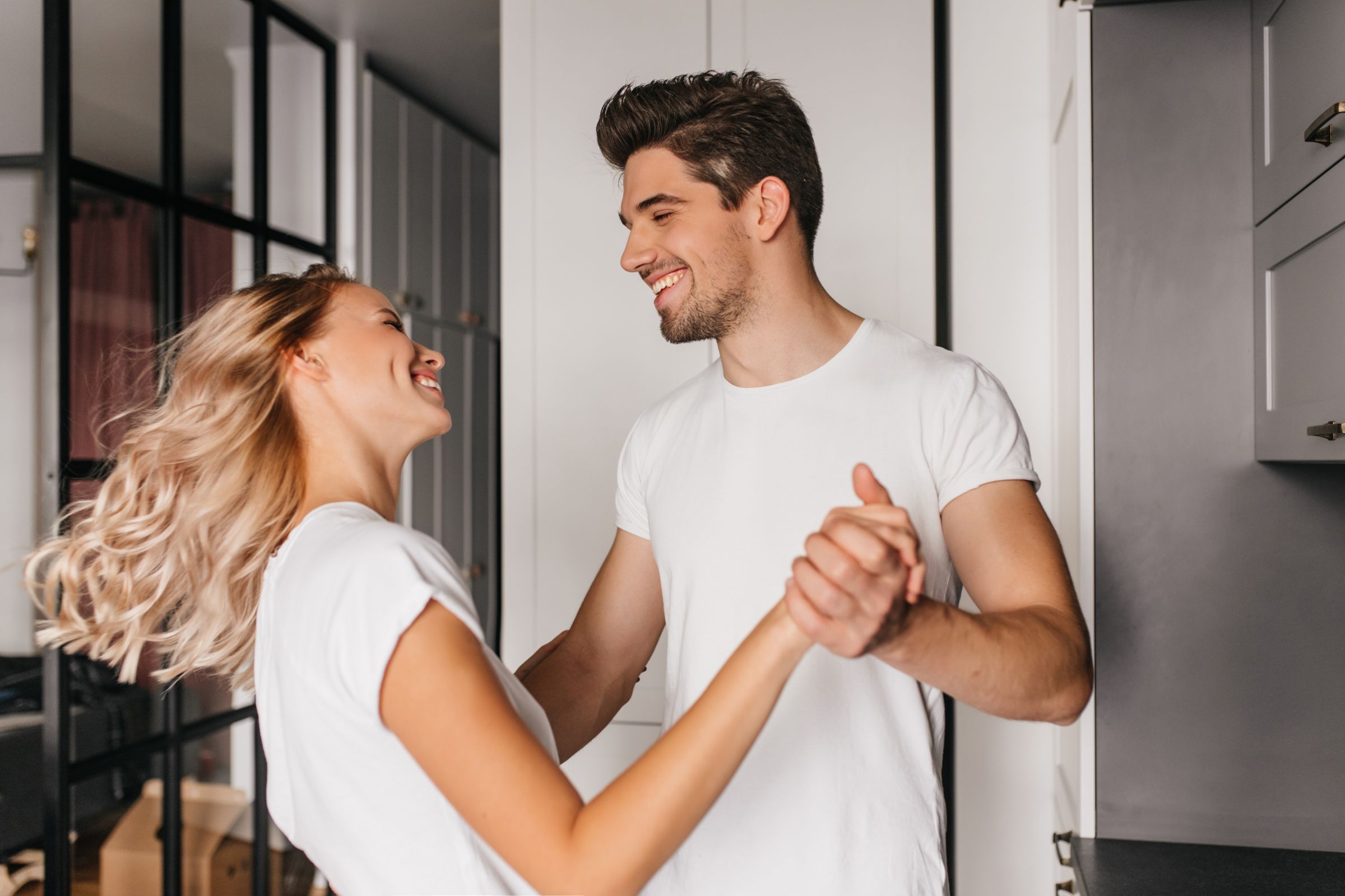 Fair Haired Pretty Girl Dancing With Man Home Indoor Portrait Young Lady Having Fun With Boyfriend